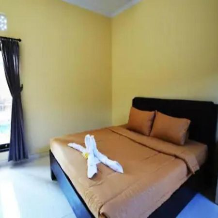 Oyo Flagship 91237 Ratu Guest House Kedunganan المظهر الخارجي الصورة